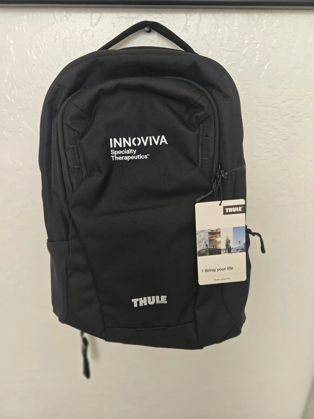 Thule Black Backpack with Innoviva Specialty Therapeutics Logo